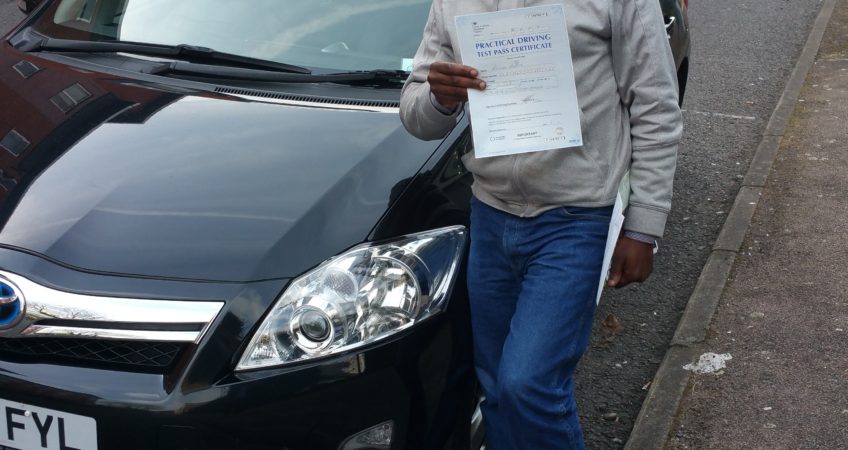 A man with driving test pass certificate